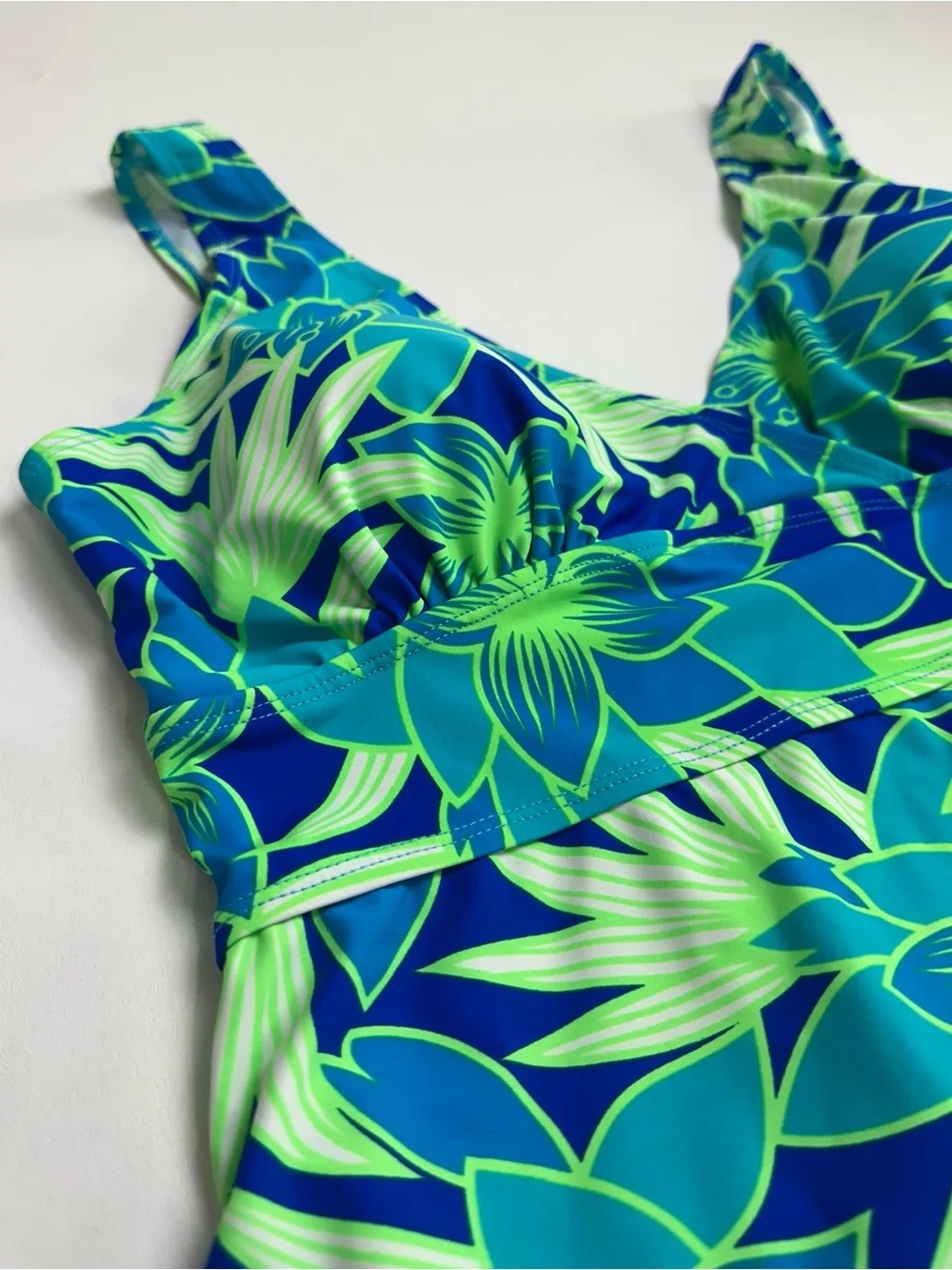 Swim outlet women’s XL  one piece swim dress .‎ Blue green, tropical print.